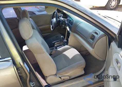 1999 Mazda 626 Es/Lx z USA, uszkodzony, nr VIN 1YVGF22C0X5869205